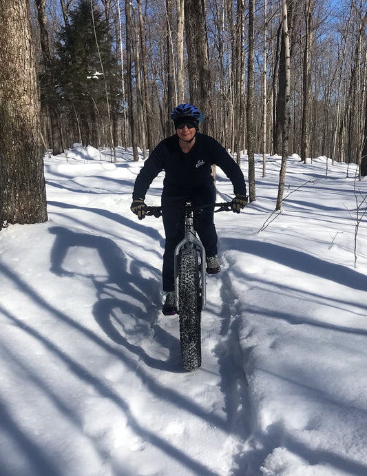 fat biking wearing bamboo crew neck sweatshirt and wool love 100% merino wool beanie