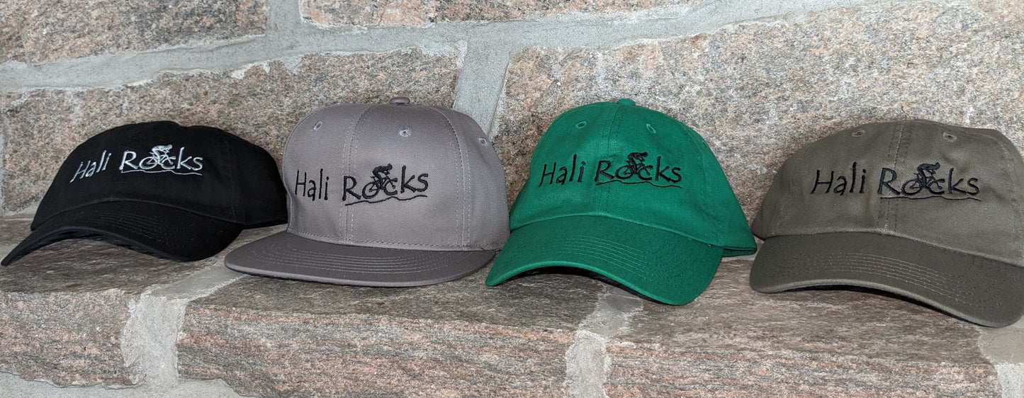 Hali Rocks Mtb Hat 100% Cotton regular curved peak colour = various, 4 colours shown Embroidery = Black with cyclist climbing rocky trail